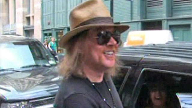 Axl Rose Storms Off Stage after Flying Bottle Incident Axl Rose Storms Off Stage after Flying Bottle Incident