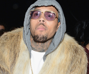 Chris Brown and Karrueche Tran Wear Matching Furs at Fashion Week