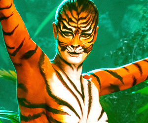 Rebecca Romijn Goes Naked (As a Tiger!) For Super Sexy "Skin Wars" Teaser