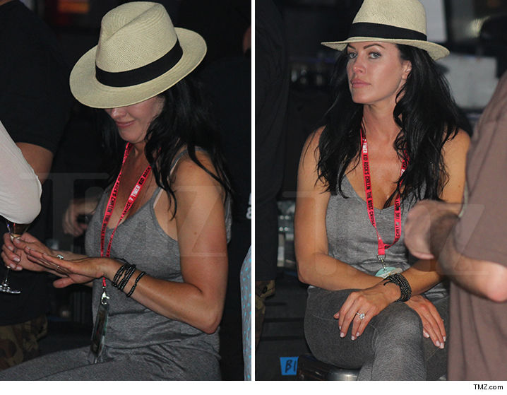 Kid Rock's fiance Audrey Berry showing off and eyeing her diamond ring