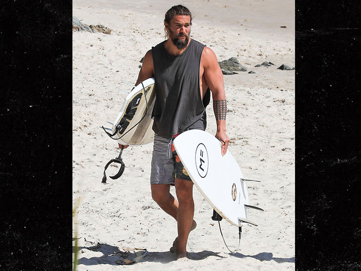 jason momoa surfing